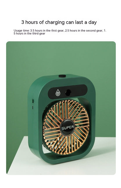 Green handheld fan with gold accents on a green background