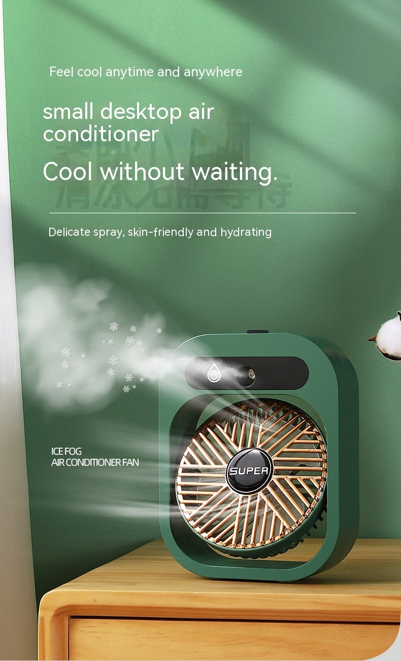 Small desktop air conditioner with green and gold design on a wooden surface against a green background.