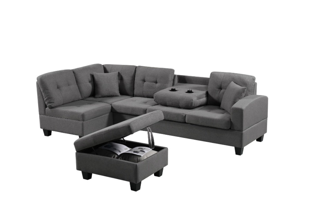 Gray sectional sofa with ottoman on a white background
