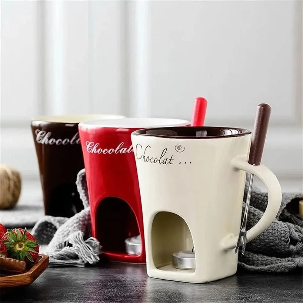 Three mugs with chocolate-themed designs on a wooden surface.