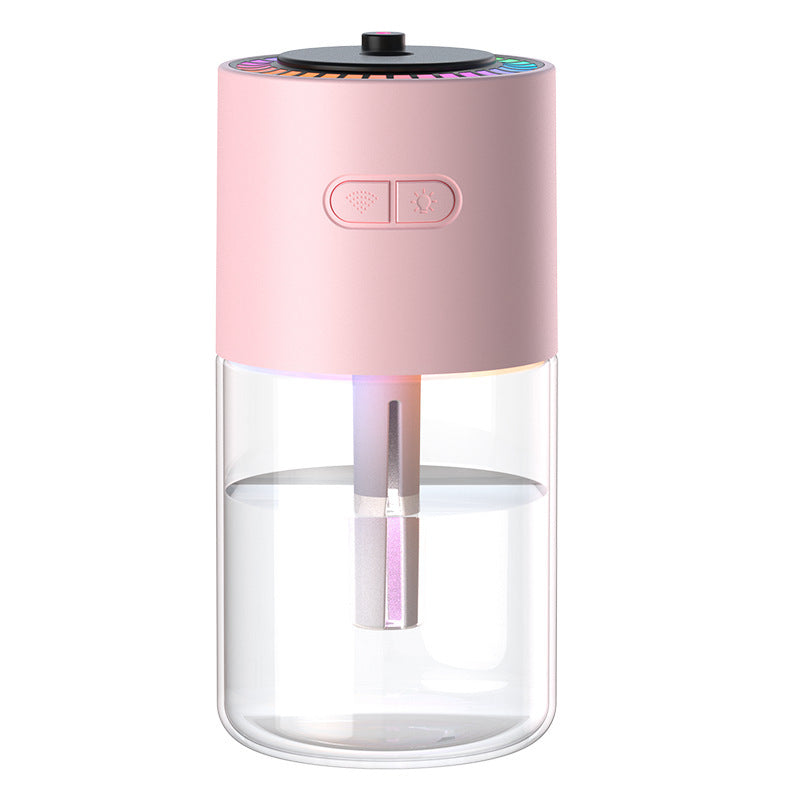 Pink and clear humidifier on a white background