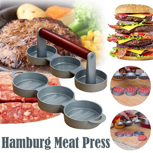 Hamburg meat press with images of burgers and raw meat, labeled 'Hamburg Meat Press'.