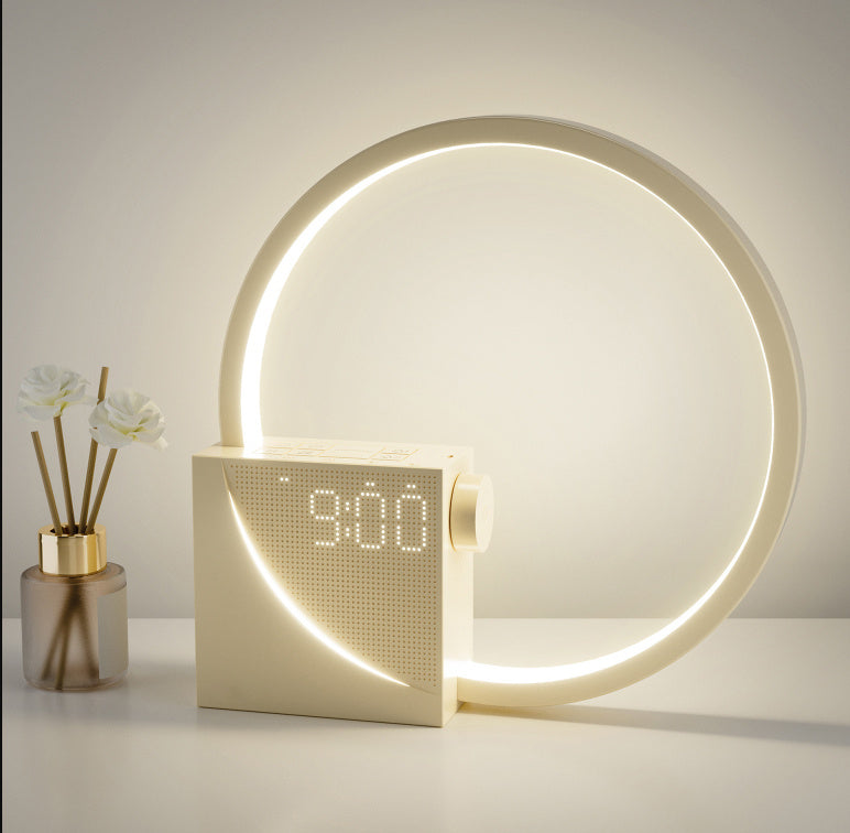 Modern LED clock with circular light feature on a neutral background