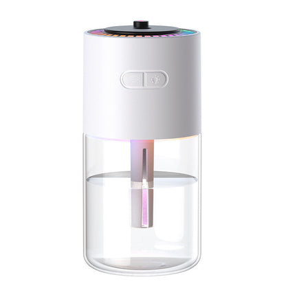 White and clear glass humidifier with colorful light on a white background