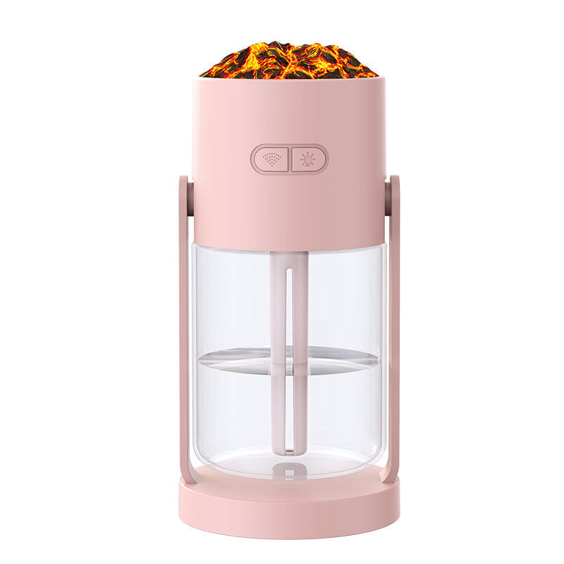 Pink portable flameless candle with visible flames on a white background