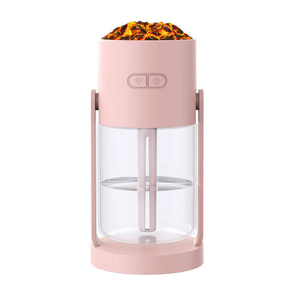 Pink portable flameless candle with visible flames on a white background